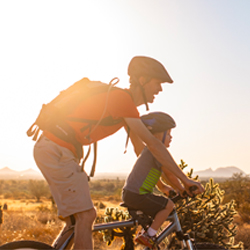 Parent and child on a bike